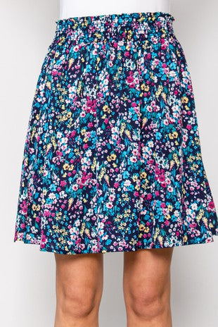 PLUS SIZE FLIRTY FLORAL SMOCKED SKIRT